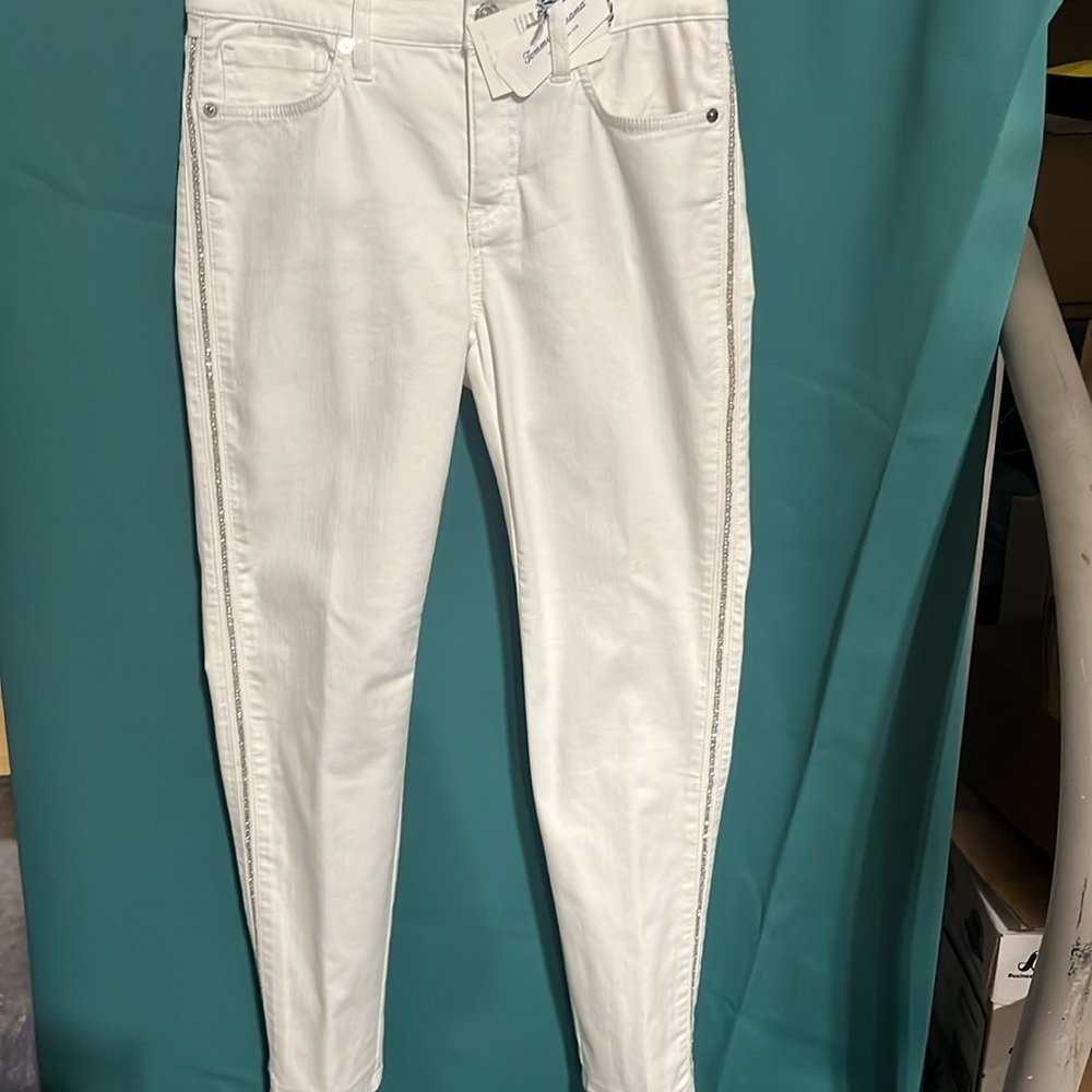 White denim jeans with one line of rhinestones down the side.